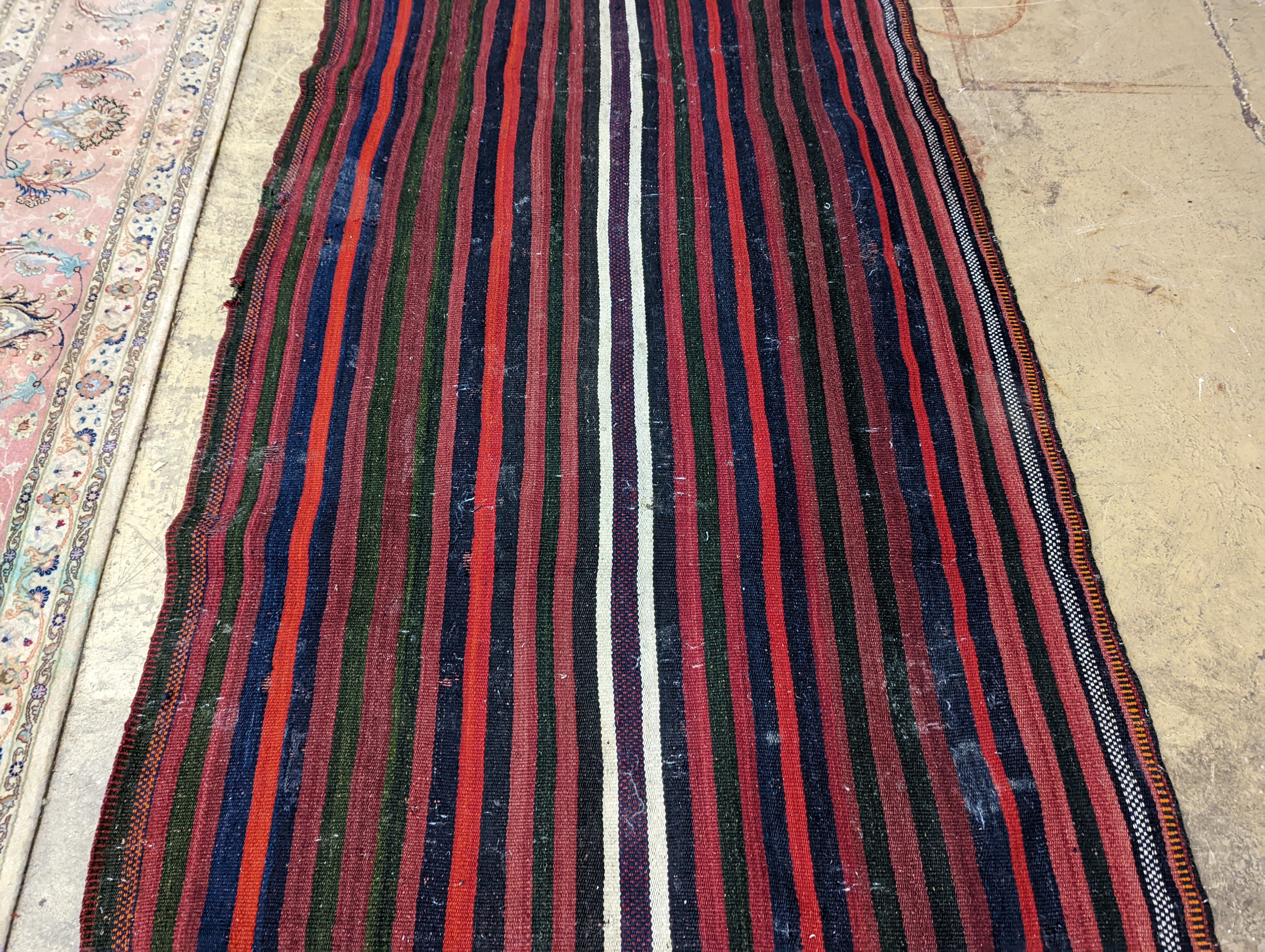 A polychrome flatweave hall carpet, 380 x 124cm